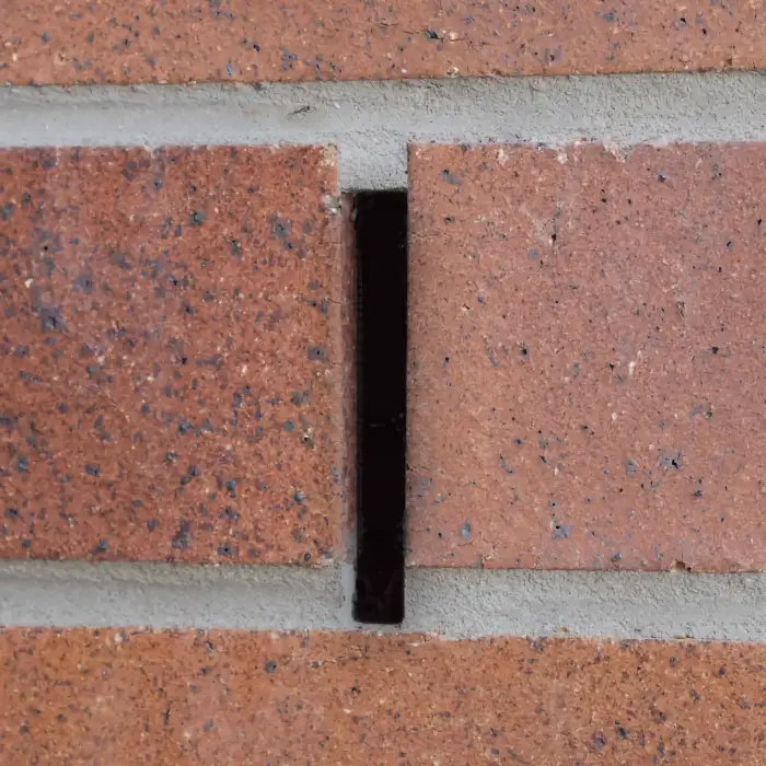 Brick weep holes appear as a vertical space between two bricks.