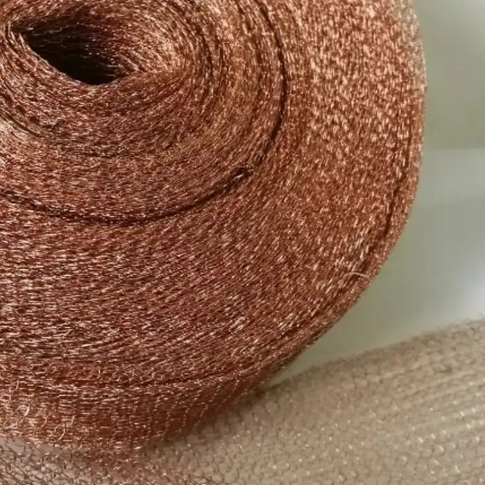 A roll of copper mesh unfurled.